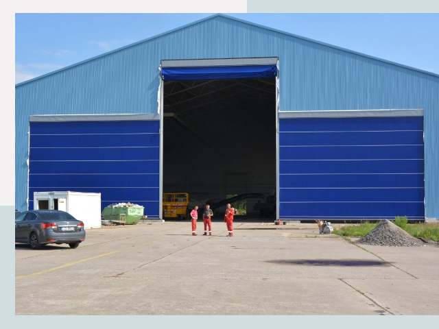 Ангарные ворота в Губаха от СтальСтрой-Гбх по цене 622 руб.